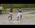 Taylor Hunter and Tasi Martinez slide in mud