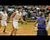 Braves' Rudy Peterson drains the triple.