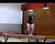 Escanaba's Erika Carne on the beam.
